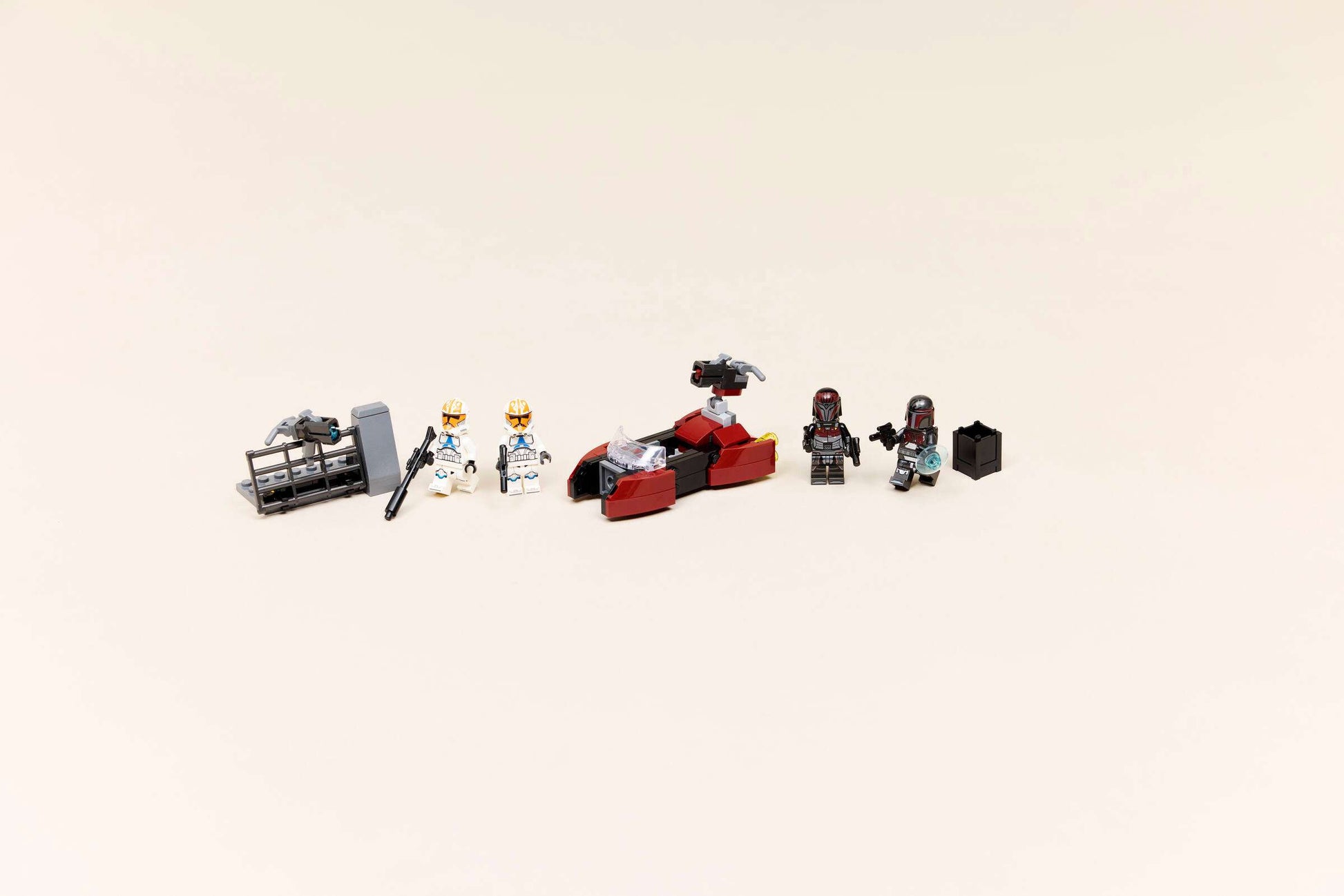The LEGO® Star Wars™ Siege of Mandalore Battle Pack by Legos - Toyhouse includes five minifigures, a red speeder, black weapon rack, and storage box—ideal for any LEGO Star Wars Battle Pack collection.