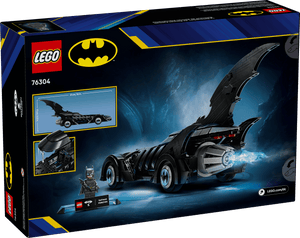 The Legos - Toyhouse LEGO® DC Batman Forever™ Batmobile™ set box displays the iconic Batmobile model, a Batman minifigure, and product details with a cave-themed background.