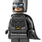 A LEGO minifigure dressed as Batman, featuring a black cape and bat emblem, pairs perfectly with the LEGO® DC Batman Forever™ Batmobile™ from Legos - Toyhouse.