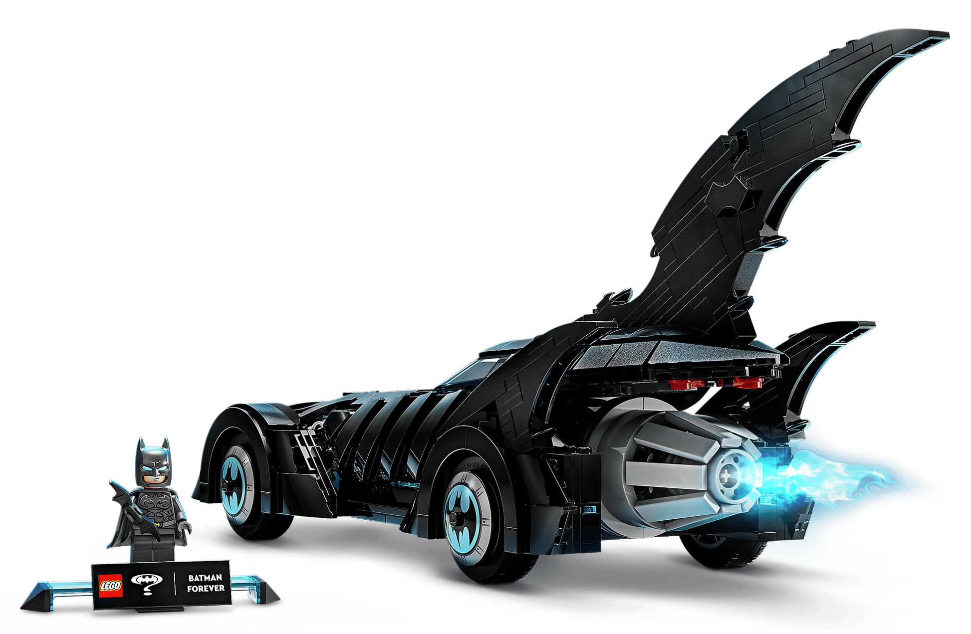 The LEGO® DC Batman Forever™ Batmobile™ by Legos - Toyhouse includes a Batman minifigure, features a sleek black design with bat-shaped wings, and blue flames from the rear engine, inspired by Batman Forever.