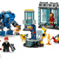 The LEGO® Marvel Iron Man's Laboratory: Hall of Armor by Legos - Toyhouse includes Iron Man minifigures, a blue mech suit, tech stations, and display cases inspired by the Marvel universe’s iconic Hall of Armor.