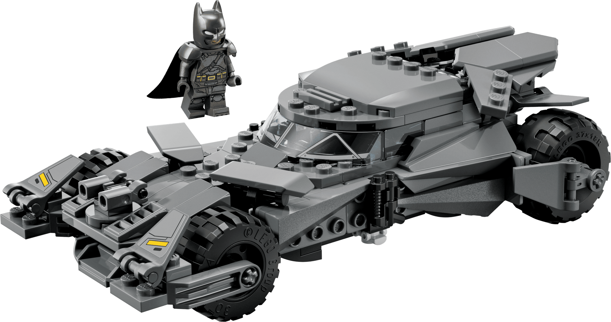 The LEGO® Batman™ v Superman™ Batmobile™ by Legos - Toyhouse features a heroic Batman minifigure beside the detailed gray Batmobile, making it an ideal display piece for fans.
