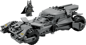 The LEGO® Batman™ v Superman™ Batmobile™ by Legos - Toyhouse features a heroic Batman minifigure beside the detailed gray Batmobile, making it an ideal display piece for fans.