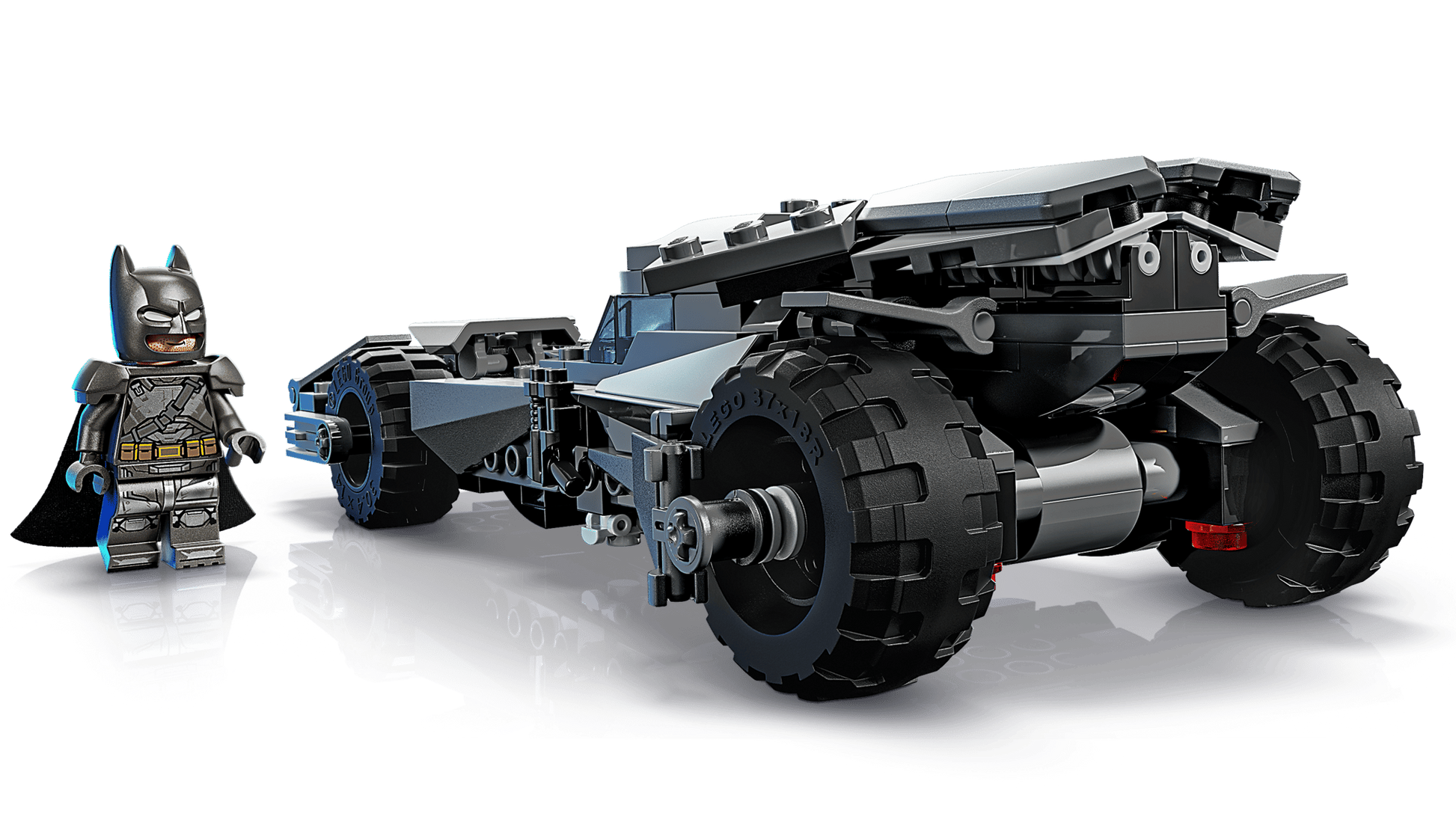 A LEGO® Batman™ v Superman™ Batmobile™ by Legos - Toyhouse is displayed with a matching Batman minifigure, both set against a plain white background.