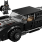 LEGO® Batman™ The Batman™ Batmobile™ by Legos - Toyhouse features a sleek black Batmobile model car and a Batman minifigure displayed beside it on a white background.