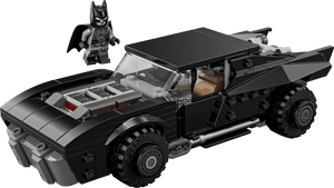 LEGO® Batman™ The Batman™ Batmobile™ by Legos - Toyhouse features a sleek black Batmobile model car and a Batman minifigure displayed beside it on a white background.