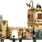 The LEGO® Harry Potter™ Hogwarts™ Castle: Flying Lessons by Legos - Toyhouse includes a detailed castle, five mini-figures with brooms and a ball for Flying Lessons, plus a statue on the left tower.
