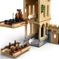 The LEGO® Harry Potter™ Hogwarts™ Castle: Flying Lessons set by Legos - Toyhouse features two detachable interiors—a candle-lit bedroom and a dining area—joined by white arrows, ideal for recreating Hogwarts Flying Lessons scenes.