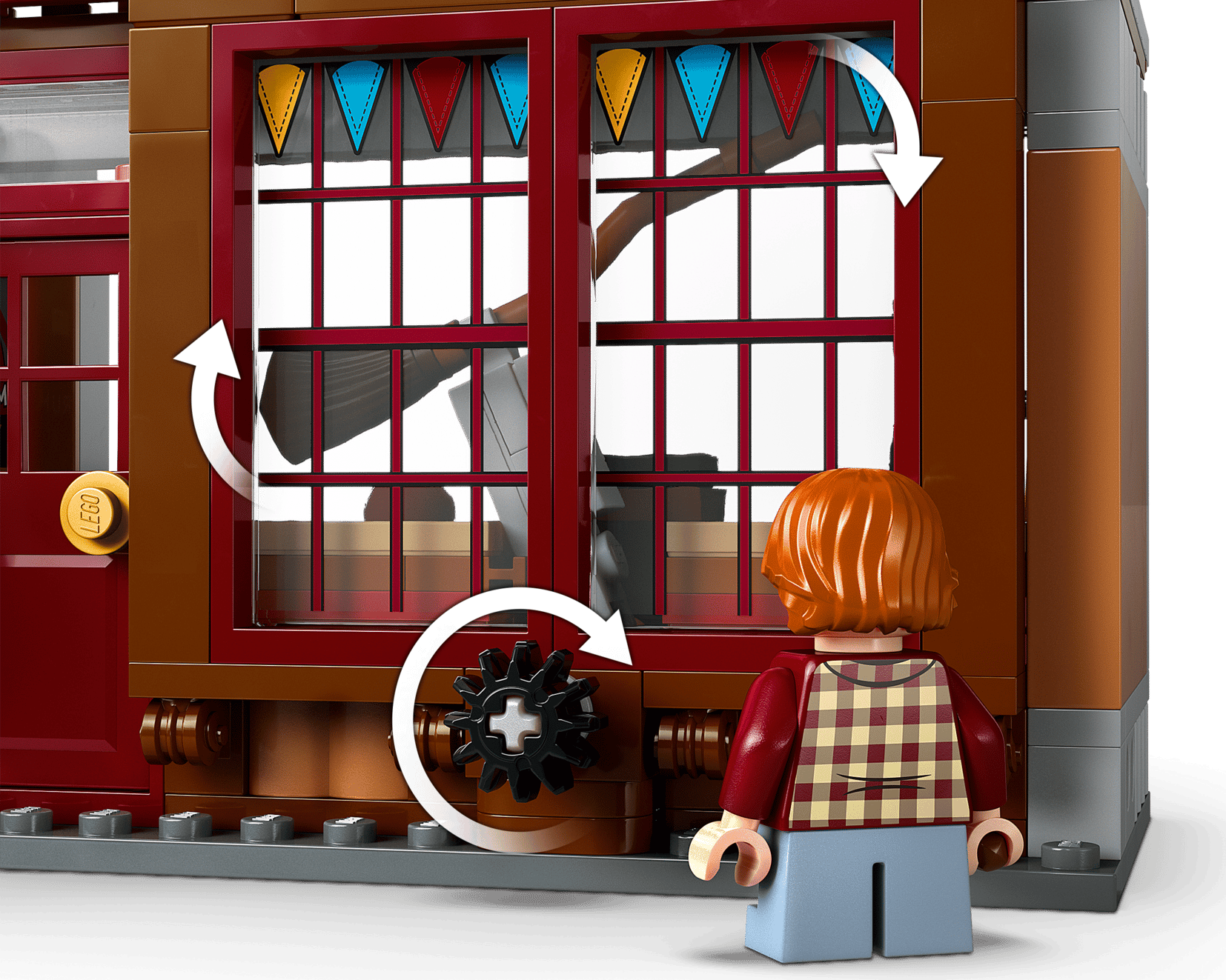 A LEGO minifigure stands before big red windows with gears and arrows, ready to explore the magical LEGO® Harry Potter™ Quality Quidditch™ Supplies & Ice Cream Parlour by Legos - Toyhouse.