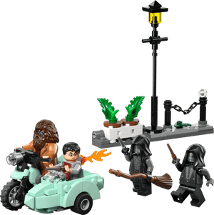 Recreate the Privet Drive escape with LEGO® Harry Potter™ Hagrid™ & Harry's Privet Drive Escape by Legos - Toyhouse, featuring Hagrid and Harry on a motorcycle with sidecar, two cloaked figures, a streetlamp, and potted plants.