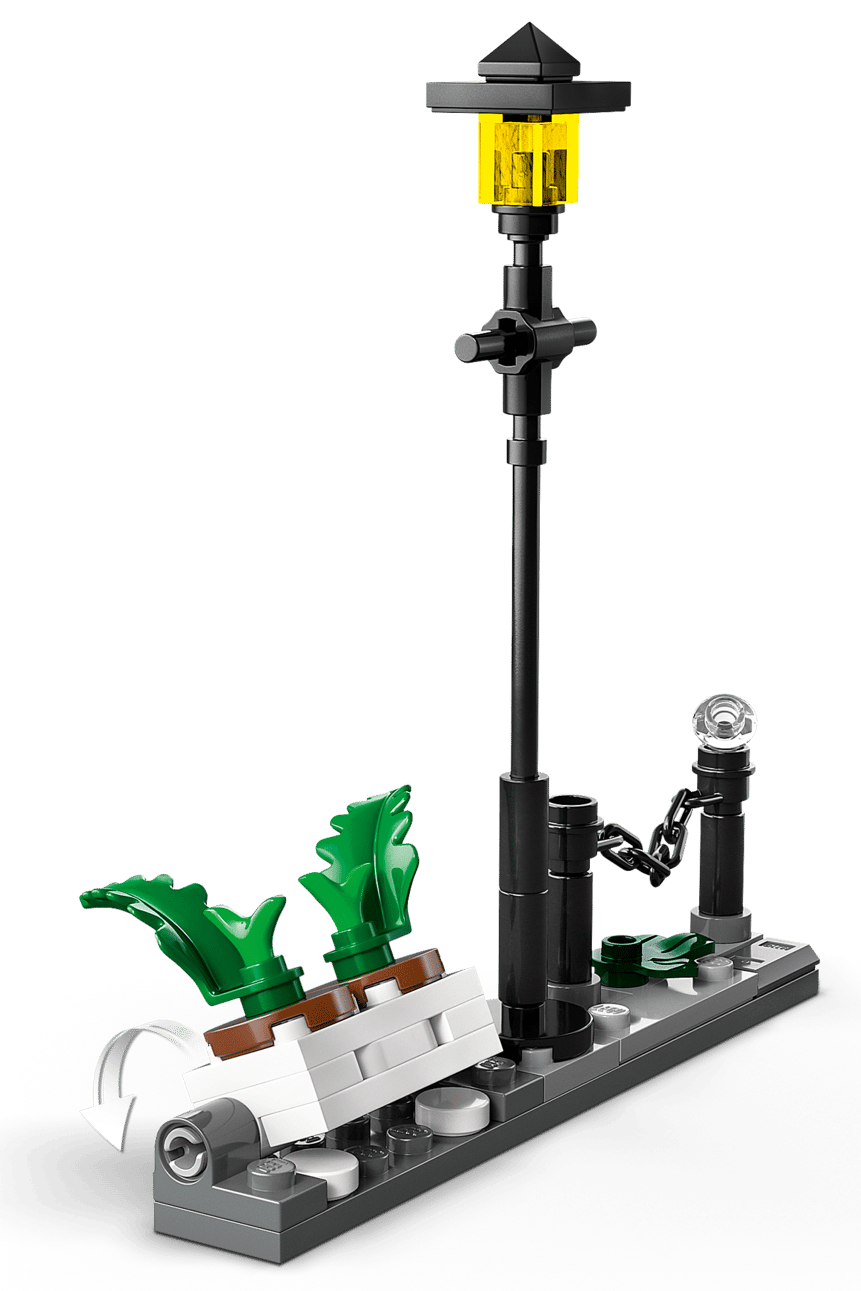 Recreate the Privet Drive escape with LEGO® Harry Potter™ Hagrid™ & Harry's Privet Drive Escape by Legos - Toyhouse, featuring a lamppost, white bench, green plants, chain, and curved sidewalk—ideal for flying motorcycle adventures.