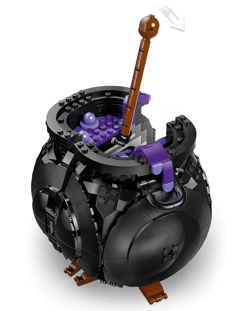 The Harry Potter™ Cauldron: Secret Potions Classroom by Legos - Toyhouse features a black cauldron, brown stirring stick, and purple pieces with a turning mechanism—ideal for potions classrooms or magical LEGO decor.