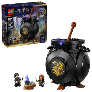 The Legos - Toyhouse Harry Potter™ Cauldron: Secret Potions Classroom set includes a round black cauldron, two minifigures, and a potion table—perfect for Harry Potter decor. The box highlights the assembled pieces and potions classroom features.