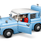 The LEGO® Harry Potter™ Enchanted Flying Ford Anglia™ by Legos - Toyhouse features blue and white colors, openable doors and trunk, two included minifigures, and a flying suitcase—perfect for LEGO Harry Potter fans.
