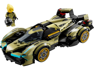 The LEGO® Speed Lamborghini Lambo V12 Vision GT Super Car by Legos - Toyhouse features a sleek black and gold design with a clear cockpit. It includes a figurine with blonde hair holding a helmet, capturing the Gran Turismo spirit.