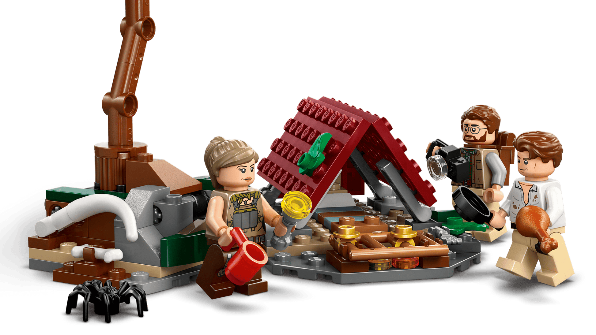 Three minifigures gather at a campsite with gold coins, a red-roofed shelter, mugs, a turkey leg, spider, and accessories—ideal for expanding your Legos - Toyhouse LEGO® Jurassic World™ Raptor & Titanosaurus Tracking Mission set.
