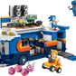 The LEGO® Sonic the Hedgehog™ Team Sonic Command Truck by Legos - Toyhouse includes a blue truck with speakers, gaming area, Sonic and Tails minifigures, enemies, cool accessories, and Tails’ own small orange vehicle.