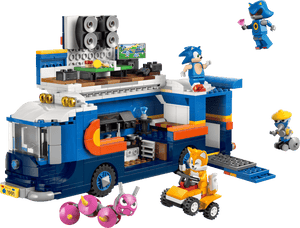 The LEGO® Sonic the Hedgehog™ Team Sonic Command Truck by Legos - Toyhouse includes a blue truck with speakers, gaming area, Sonic and Tails minifigures, enemies, cool accessories, and Tails’ own small orange vehicle.