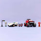 The LEGO® Sonic the Hedgehog™ Silver's Car vs. Knuckles' Monster Truck set by Legos - Toyhouse includes two cars, a traffic light, cart, and two minifigures—perfect for fans of video game building toys on a light purple background.