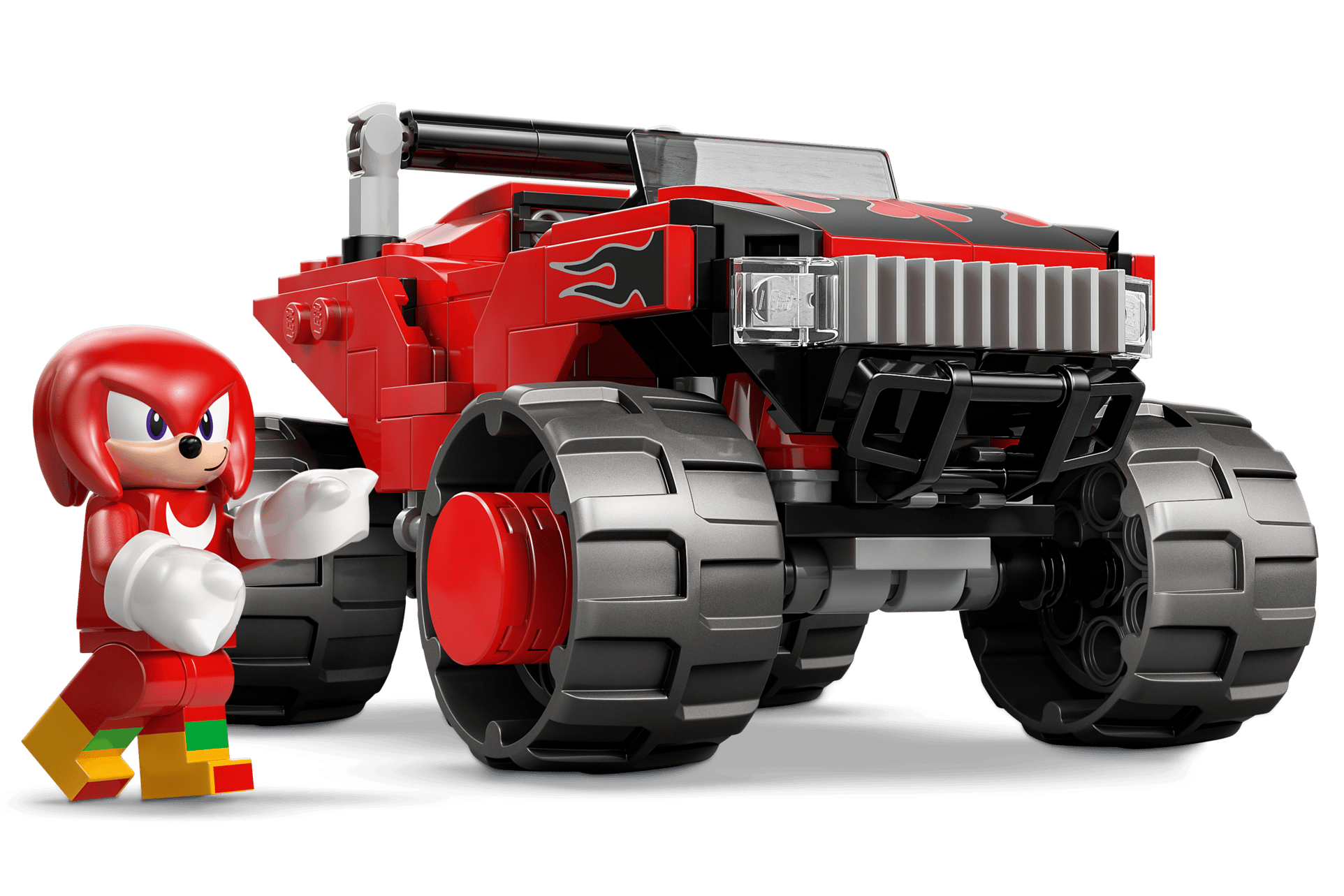 A red toy car with large wheels and flame decals is next to a red figurine with spiked hair, white gloves, and multicolored shoes—ideal for fans of LEGO® Sonic the Hedgehog™ Silver's Car vs. Knuckles' Monster Truck by Legos - Toyhouse.