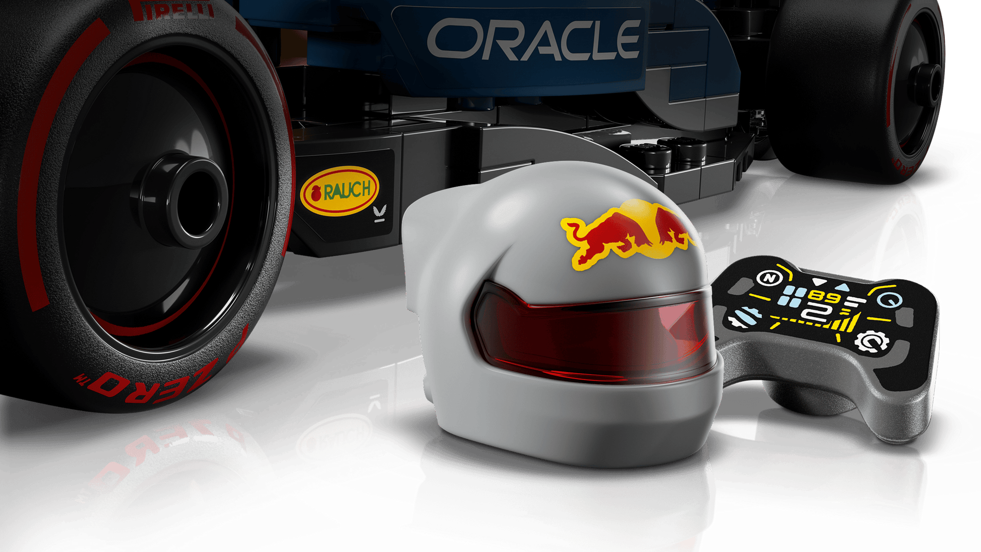 A close-up of the LEGO® Speed Champions Oracle Red Bull Racing RB20 F1® Race Car by Legos - Toyhouse, featuring a gray helmet with a red visor and a black controller with colorful buttons and displays.