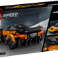 The Legos - Toyhouse LEGO® Speed Champions McLaren W1 set box features a race car toy next to the real McLaren W1 and a close-up of building instructions, all set against a sleek black background.