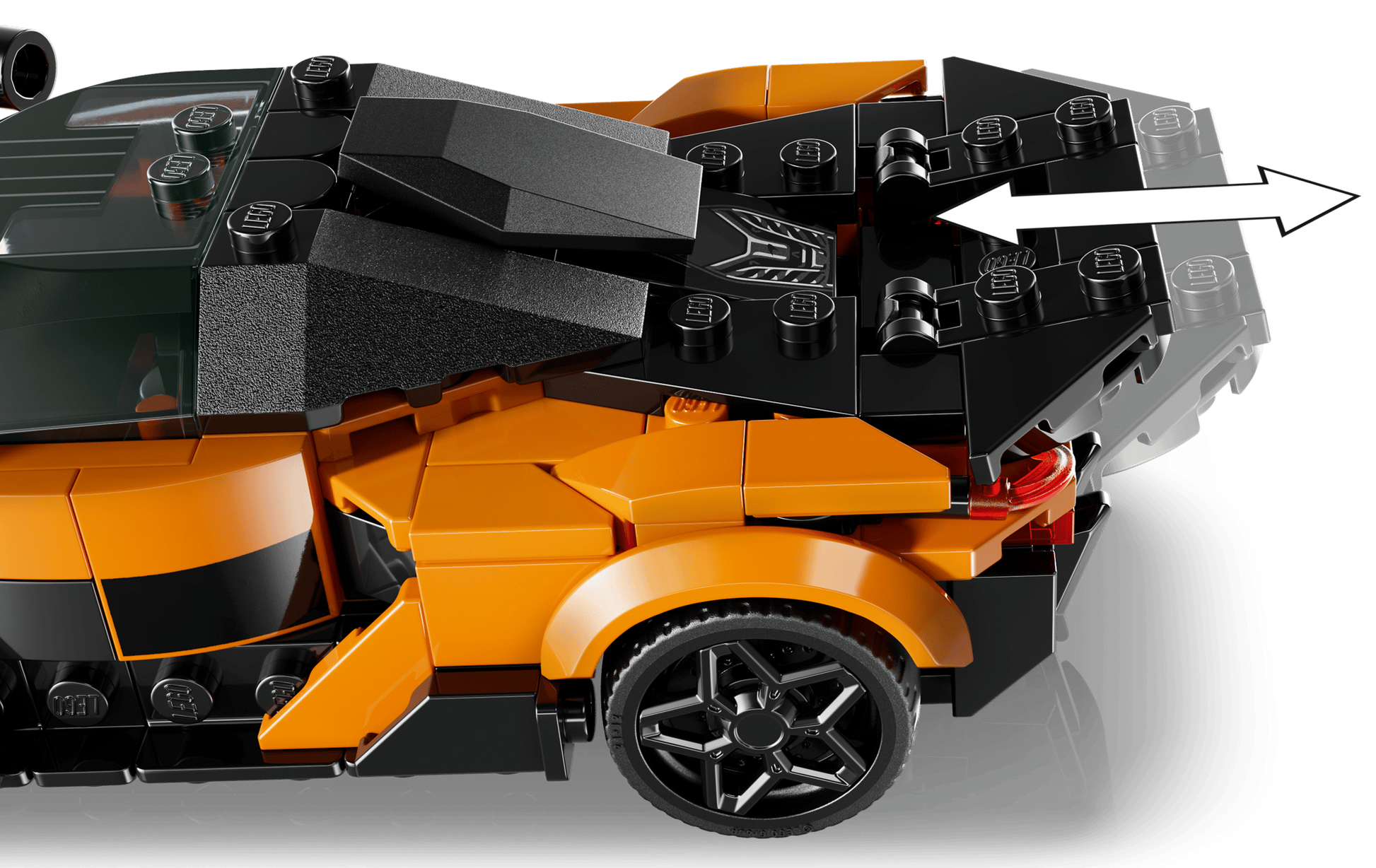 Close-up of the LEGO® Speed Champions McLaren W1 by Legos - Toyhouse, with an arrow highlighting the adjustable rear spoiler.