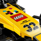 Close-up of the LEGO® Speed Champions F1 ACADEMY™ LEGO® Race Car by Legos - Toyhouse, showcasing the LEGO® logo and racing-themed decals on its yellow front section.