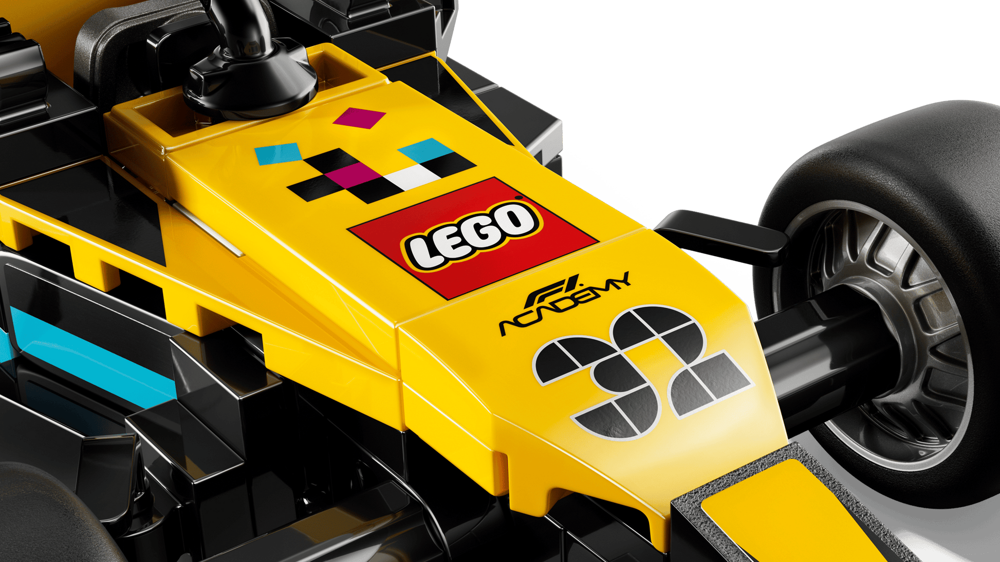 Close-up of the LEGO® Speed Champions F1 ACADEMY™ LEGO® Race Car by Legos - Toyhouse, showcasing the LEGO® logo and racing-themed decals on its yellow front section.