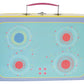 A rectangular Musical Kitchen Set 12 Piece - Rainbow Fairy by Floss and Rock, featuring a teal surface, four illustrated burners, a pink handle, and decorative star patterns is shown from the front—perfect for imaginative play and a charming addition to any Rainbow Fairy Tea Set.
