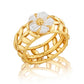 The Villandry Fleur Vine Ring by Juliska Capucine De Wulf features a golden vine with a delicate mother of pearl flower, perfect for adding elegance to your garden party look. Shown on a crisp white background.