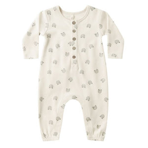 The Quincy Mae Baby Long Sleeve Jumpsuit features a cream color, small bear face prints, and a button-up front with coconut buttons.