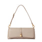 The Ryder Pouchette Shoulder Bag by Stella McCartney is a beige, rectangular luxury vegan bag featuring gold hardware, an adjustable strap, and a small gold padlock accent on the front flap, set against a white background.