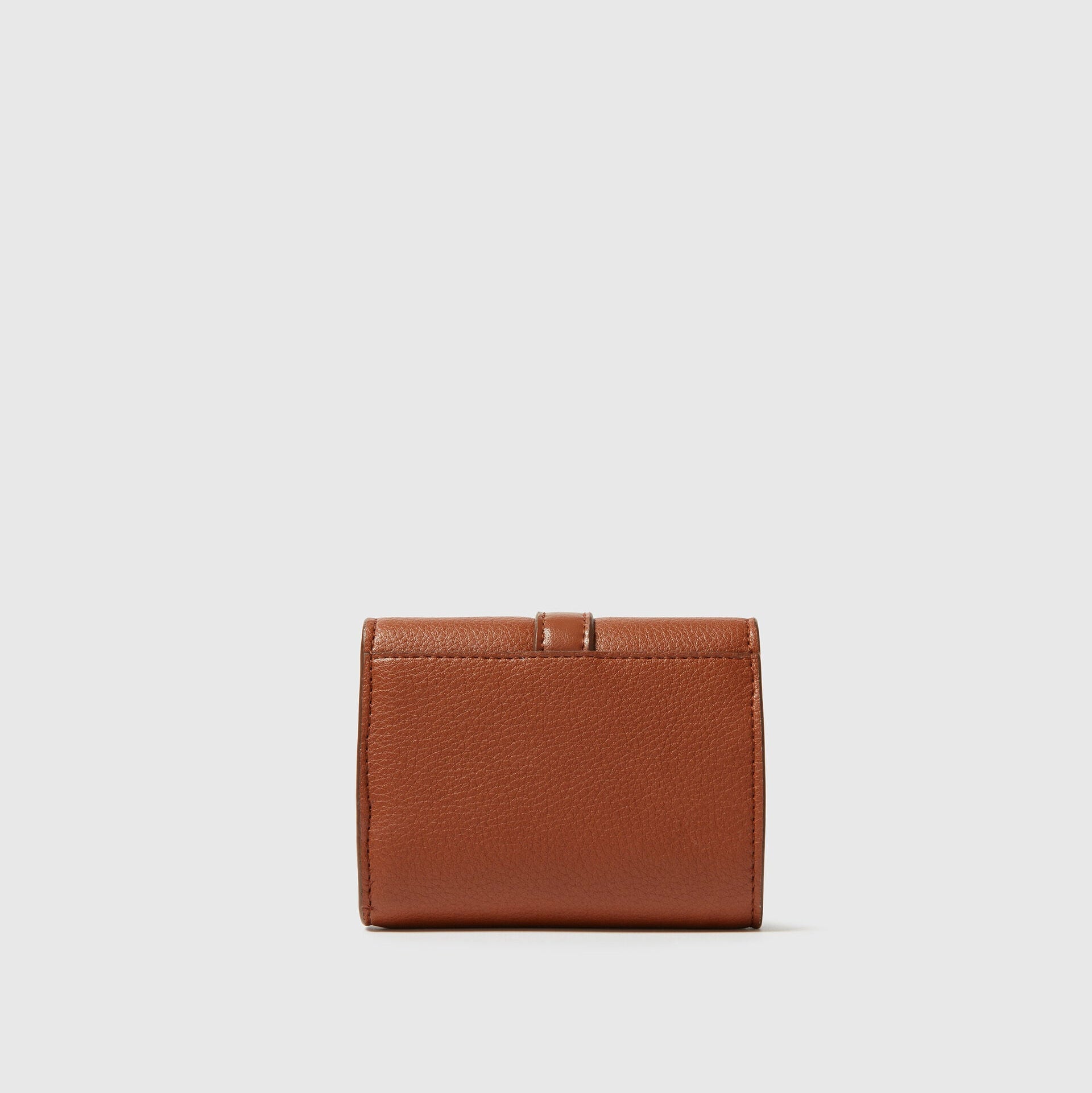 The Ryder Trifold Wallet by Stella McCartney, a small rectangular brown wallet crafted in Italy, is centered on a plain light gray background.