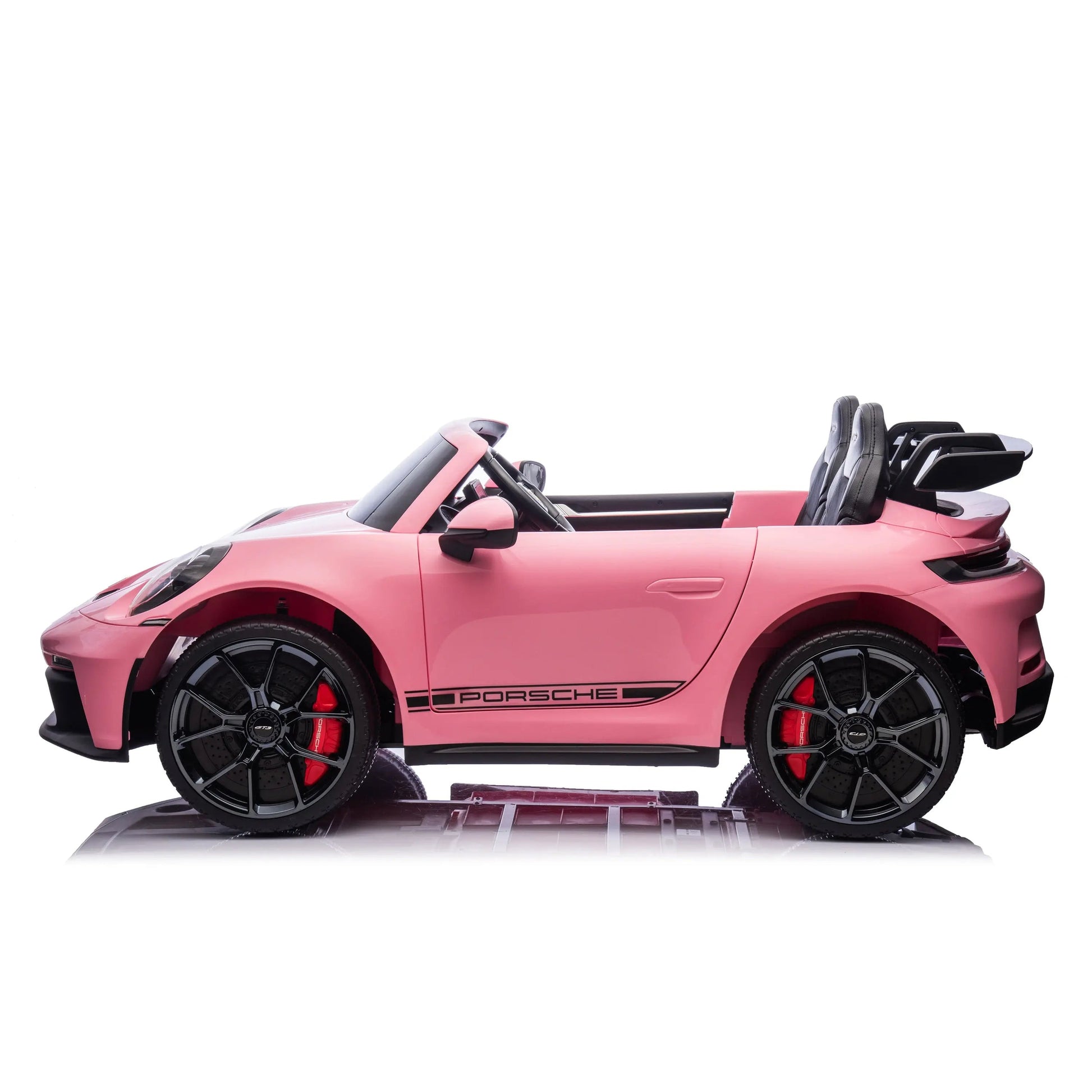 The Freddo 24V Porsche 911 GT3 Pink 2 Seater Ride-On features a stylish pink convertible design with black wheels and red brake calipers, displayed in profile against a white background. This kids’ electric car offers an exciting two-seater experience modeled after the iconic Porsche 911 GT3.