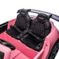 Two black GT3 seats with seatbelts inside the Freddo 24V Porsche 911 GT3 Pink 2 Seater Ride-On, shown from above and slightly to the side, with a partially visible steering wheel.