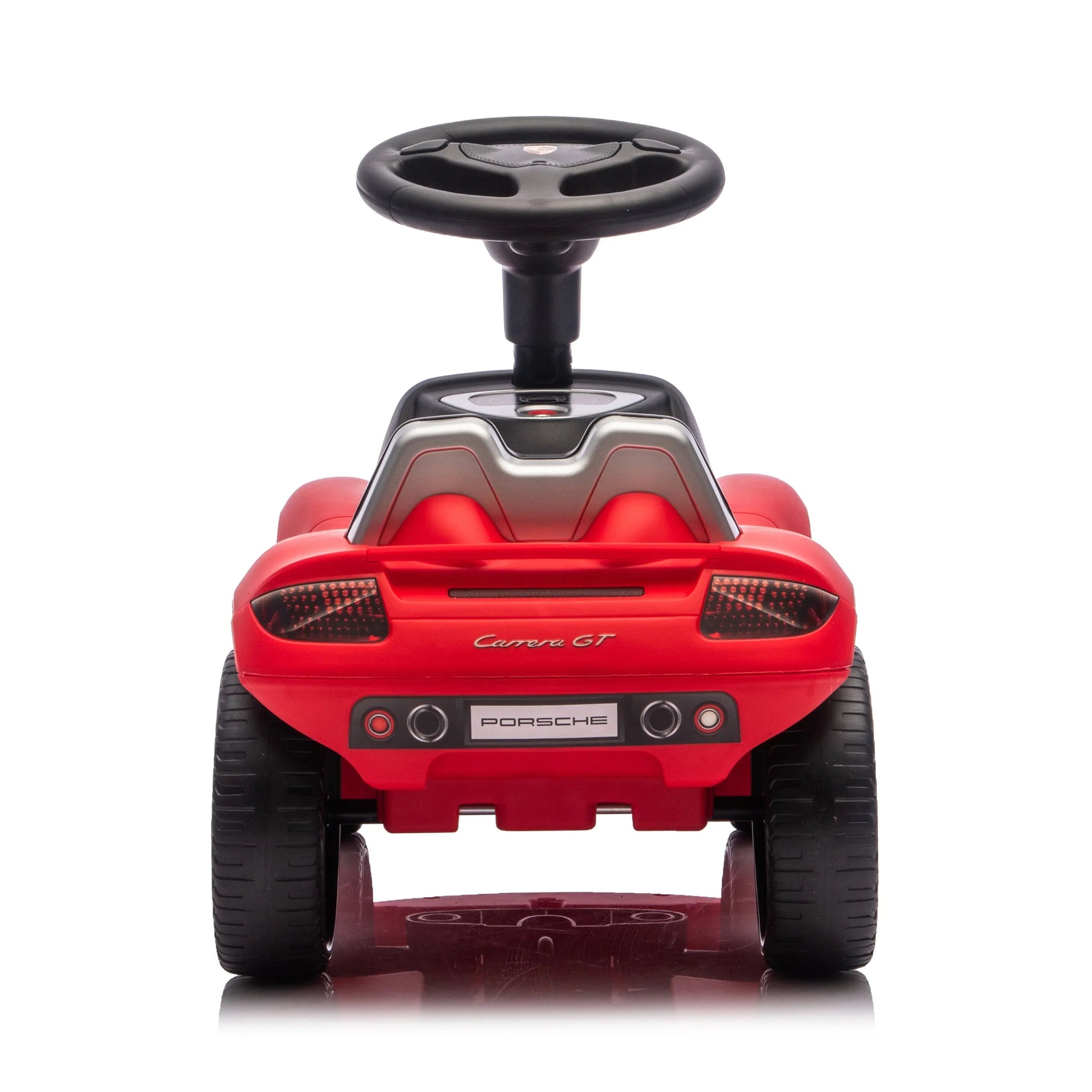 A red Freddo Porsche 911 Carrera GT foot-to-floor ride-on toy car with a black steering wheel, shown from the rear against a white background.