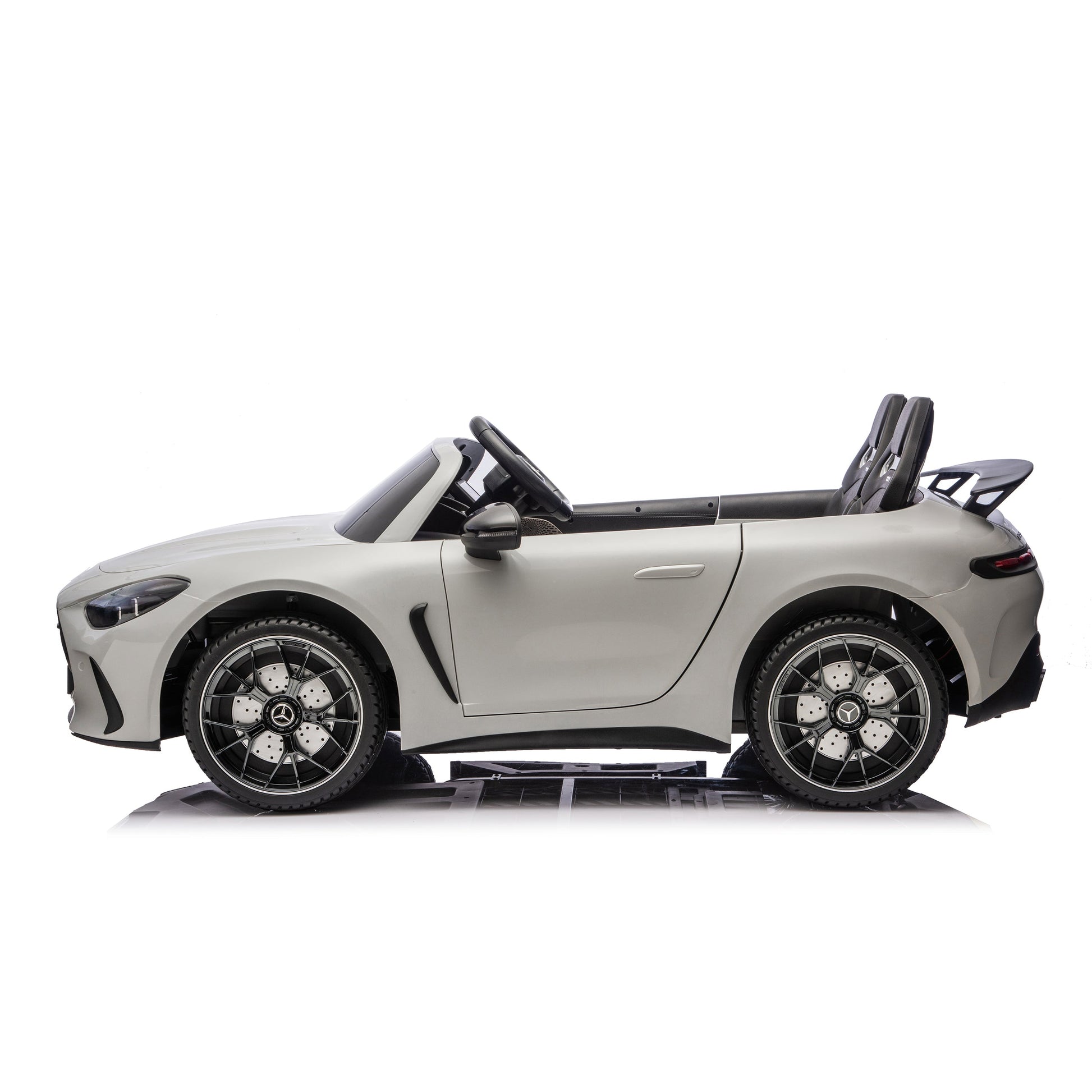 A gray Freddo 24V Mercedes AMG GT63 2 seater ride-on car is shown in profile view against a white background. This stylish ride-on offers kids an exciting and realistic driving experience.
