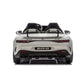The Freddo 24V Mercedes AMG GT63 Gray 2 Seater Ride-On is shown from the rear, displaying its dual seats, distinctive taillights, quad exhausts, and authentic AMG branding against a white background—this ride-on car captures the sleek design of the legendary Mercedes AMG GT63 for young drivers.