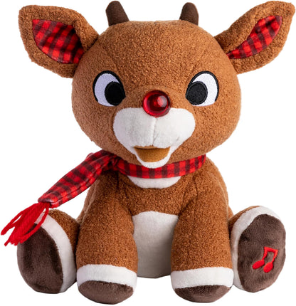 The Kids Preferred Rudolph Plush with Music and Lights features a red nose, plaid scarf, and musical foot embroidery. This Christmas classic sits upright against a white background.