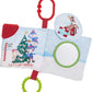The Kids Preferred Rudolph Soft Book is a sensory baby activity toy featuring elves decorating a Christmas tree, a red teether, green ring, mirror, and reindeer illustration on a snowy background.