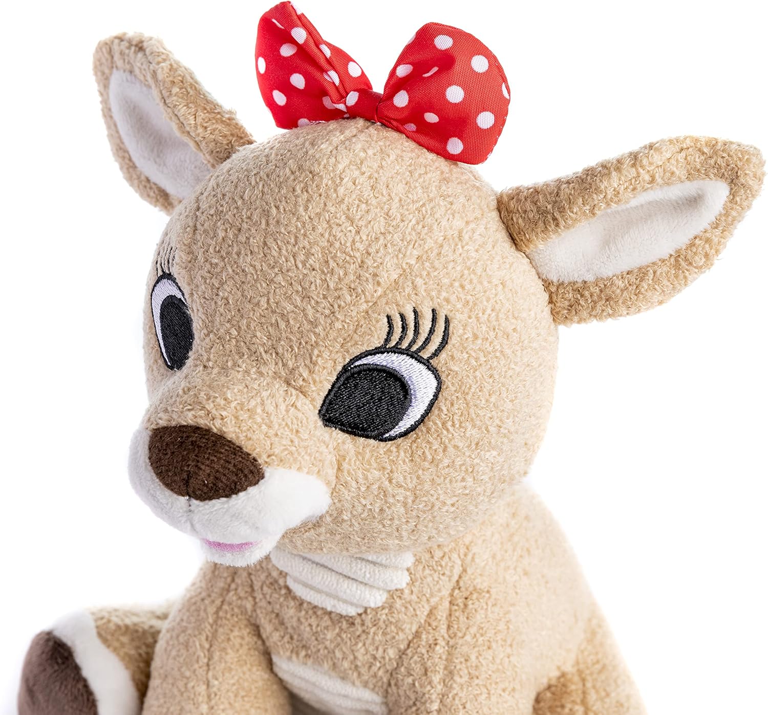The Kids Preferred Clarice Plush features large embroidered eyes, long lashes, a red and white polka dot bow, and soft light brown fur—a charming nod to the Christmas classic "Rudolph.