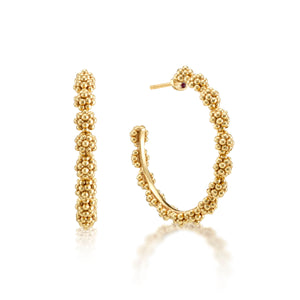 The Berry Icon Medium Hoop Earrings by Juliska Capucine De Wulf feature a golden, berries-inspired beaded texture and are shown from front and side views against a white background.
