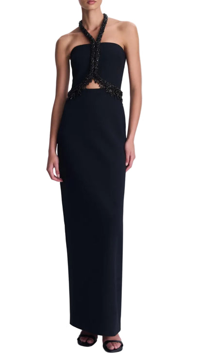 Simkhai Zoriel Gown: a black floor-length strapless column gown featuring an embellished halter neckline and waist cutout.