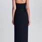 Back view of the black Simkhai Zoriel Gown featuring beaded trim at the strapless neckline and waist.