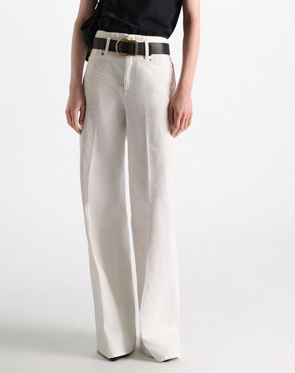 Off-white wide-leg Denim Attraction Pant in pure cotton denim, styled with a black leather belt.