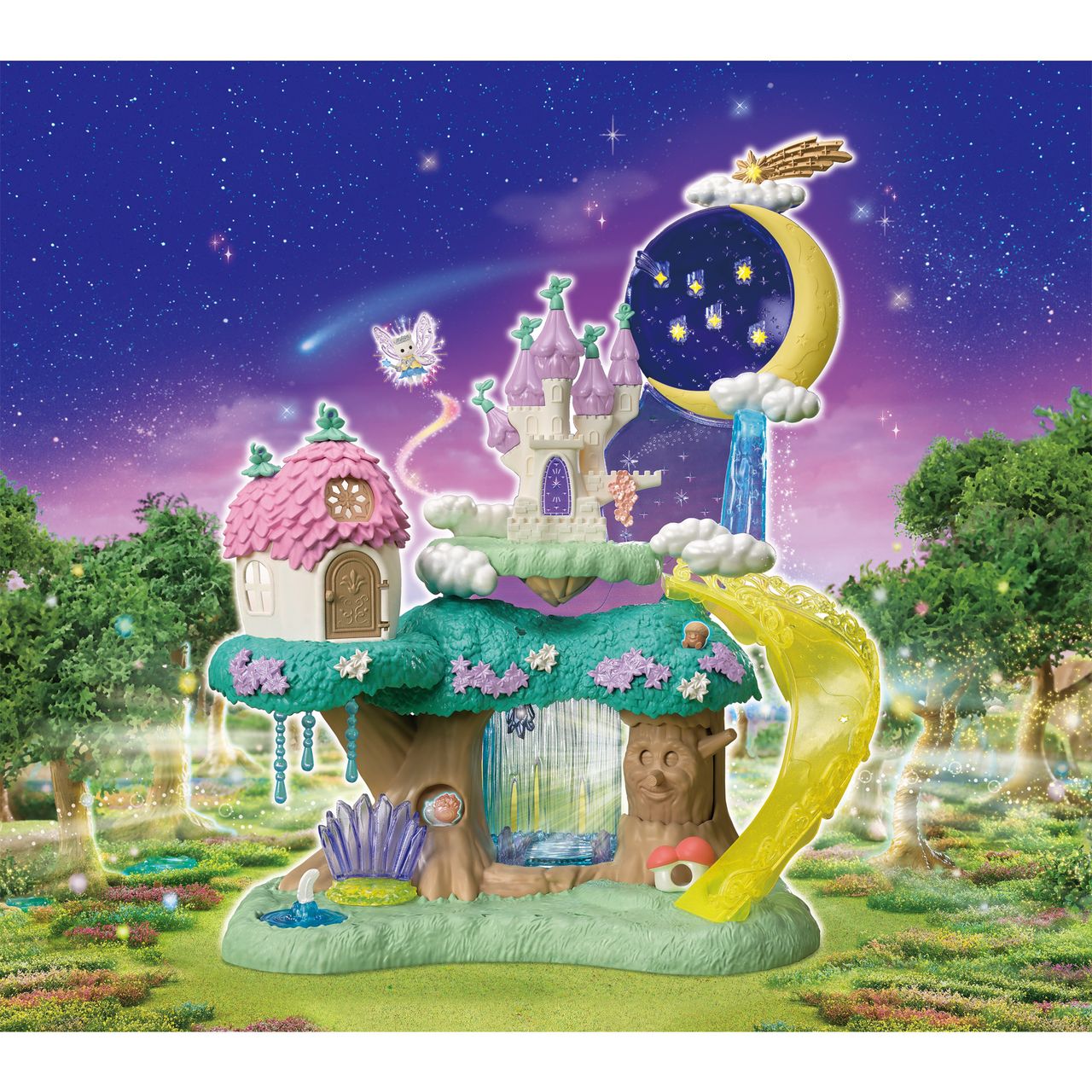 Introducing the Calico Critters Woodland Wonder Fairy Castle—a whimsical toy playset featuring a magical castle and treehouse, complete with a yellow slide set under a starry sky and crescent moon, all nestled in a lush, green fairy forest landscape.