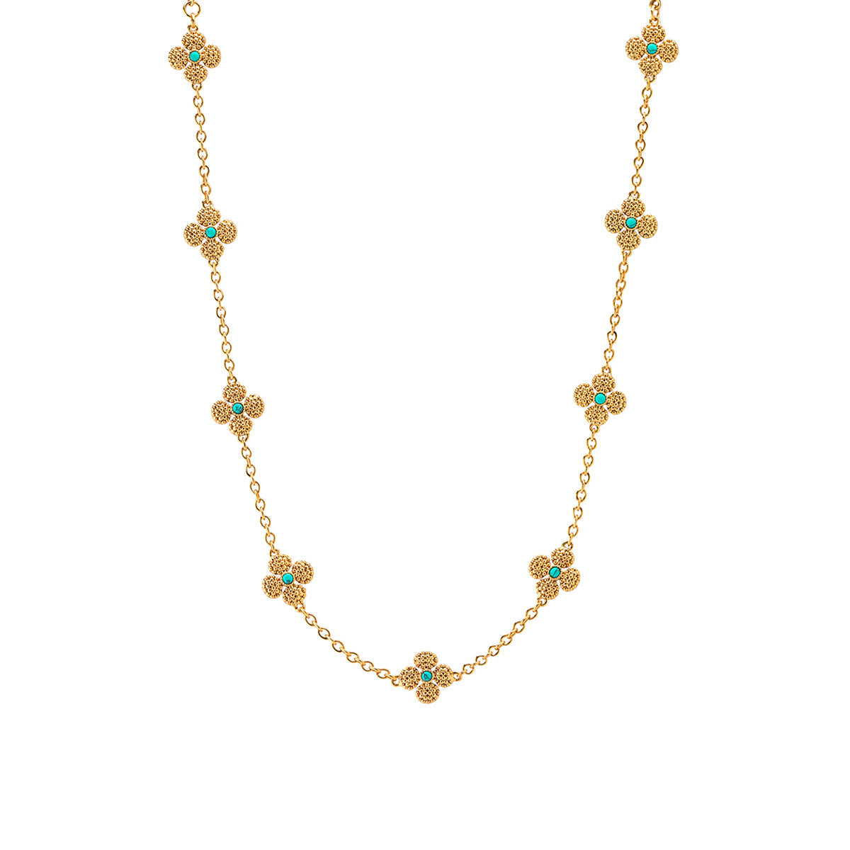 The Juliska Capucine De Wulf Berry Clover Double Sided Necklace features multiple clover charms with turquoise accents, beautifully spaced along a delicate station chain.