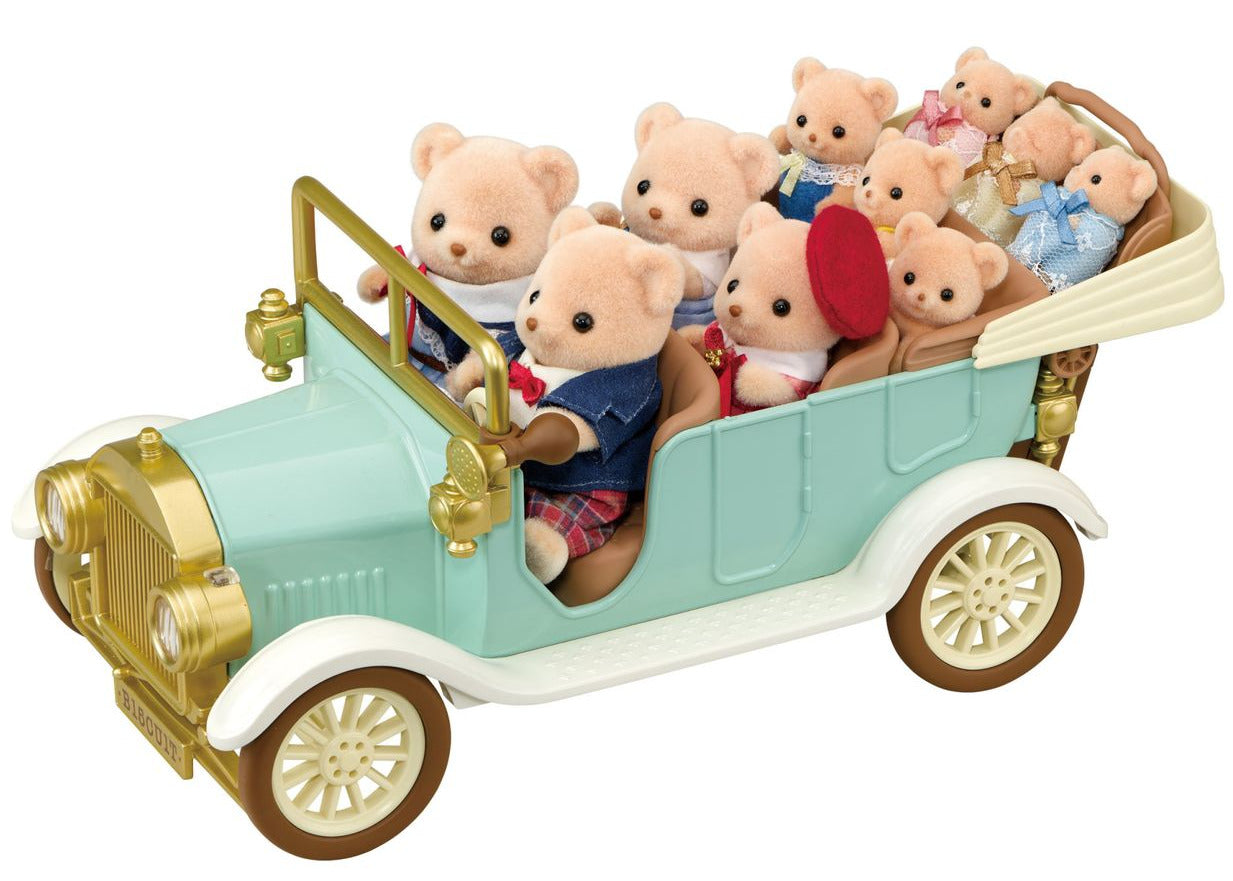 Calico Critters Classic Family Car features a light blue vehicle with gold accents, a white roof, and seating for up to 10 figures in three rows, complete with charming toy car accessories.