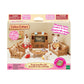The Calico Critters Comfy Living Room Set box displays adorable rabbit figures with a cozy sofa, armchairs, table, TV stand with TV, and charming accessories arranged in a welcoming living room scene—perfect dollhouse furniture for any Calico Critters collection.